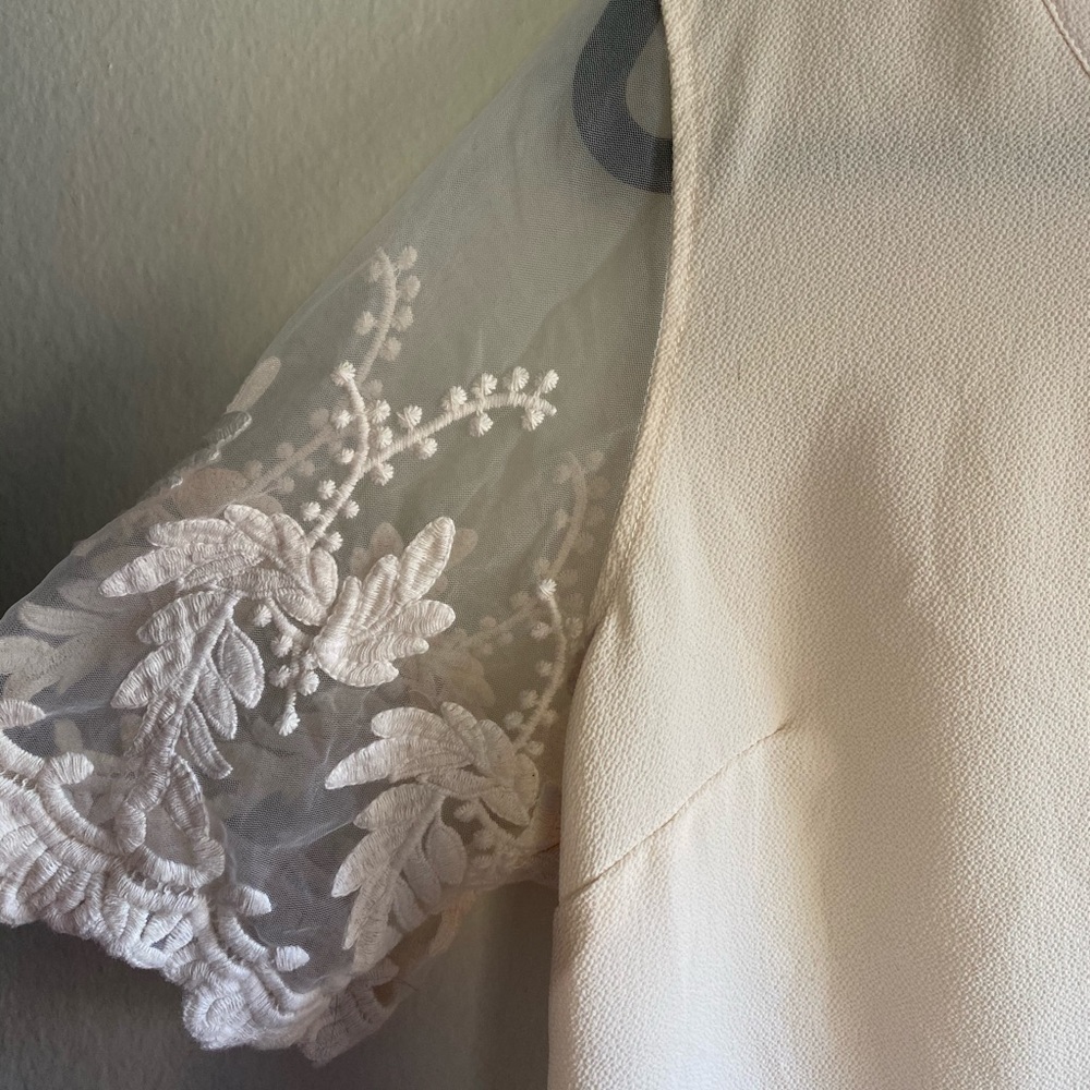 Cream Flowy Blouse with Laced Sleeves